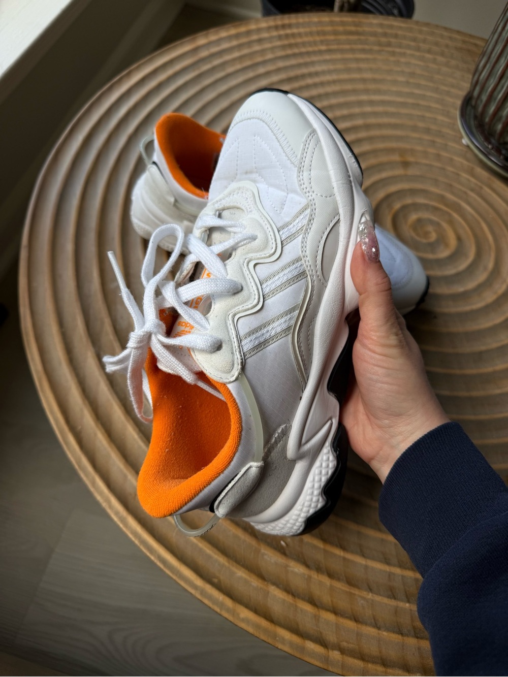 White Adidas Ozweego with Bright Orange Lining